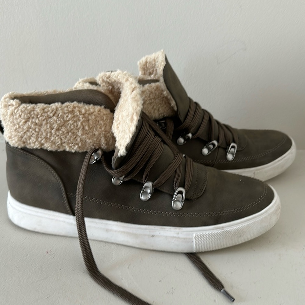 Green shearling high tops